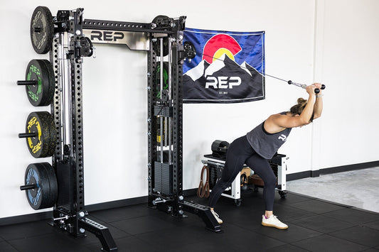An athlete tackles cable overhead extensions.
