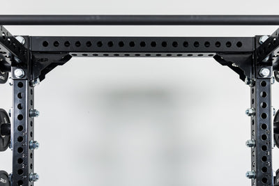 Close-Up of Compact Logo Plate Crossmember 2.0 on a REP power rack